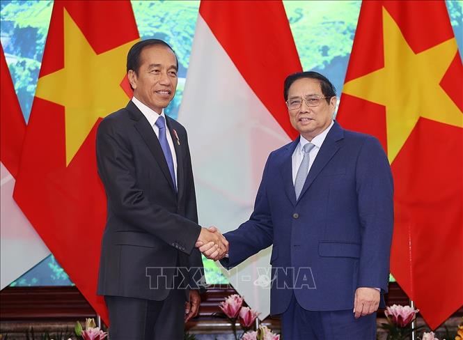Thủ tướng Phạm Minh Chính, Chủ tịch Quốc hội Vương Đình Huệ hội kiến Tổng thống Indonesia Joko Widodo- Ảnh 1.