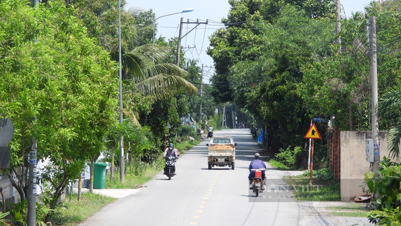 Đường giao thông nông thôn mới ở xã An Sơn, TP.Thuận An. Ảnh: Nguyên Vỹ