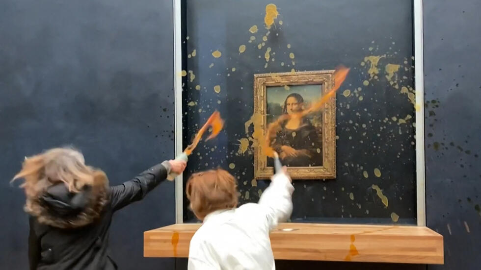 Nàng Mona Lisa "vấy bẩn" vì bị hắt súp bí ngô- Ảnh 1.