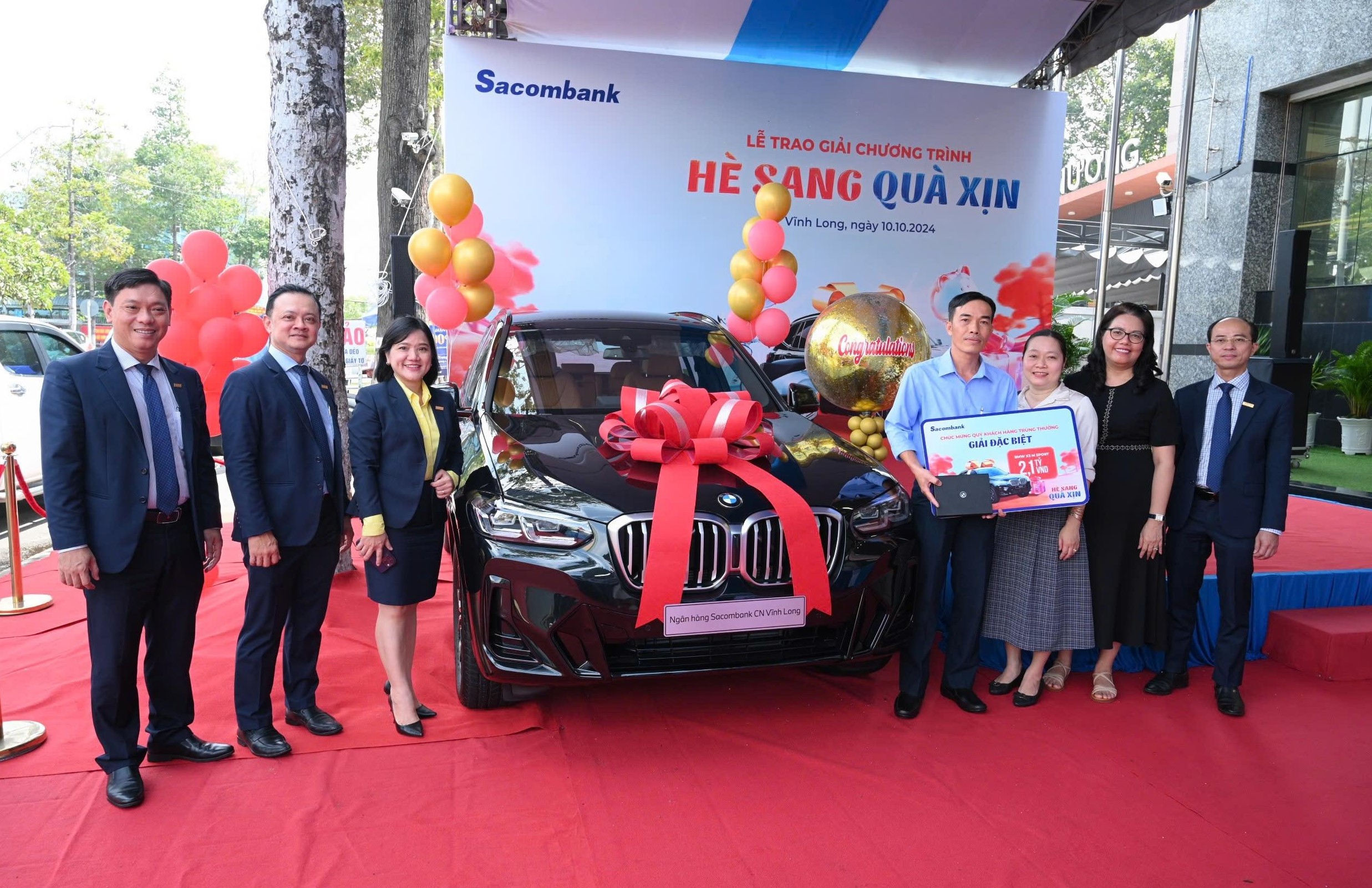 Sacombank trao 2 ô tô BMW hơn 4 tỷ đồng đến khách hàng tại Bạc Liêu, Vĩnh Long - Ảnh 1.