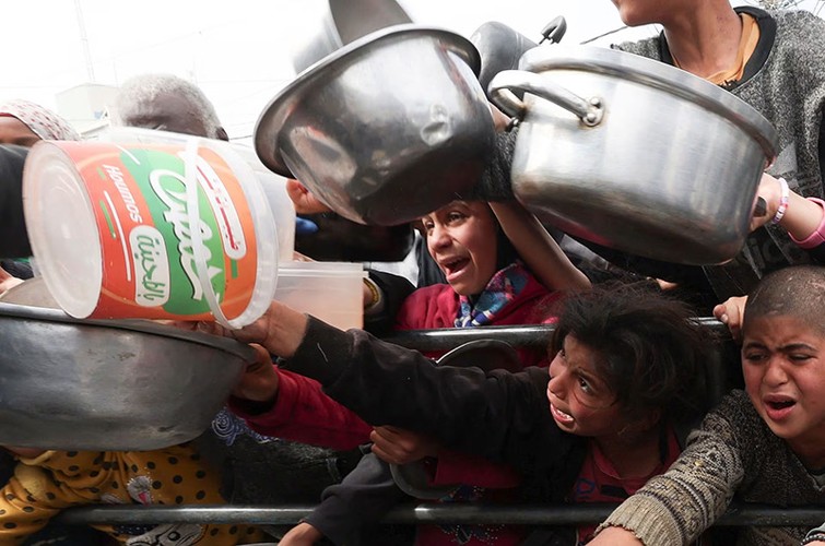 Hình ảnh nạn đói đạt đến mức khủng hoảng ở dải Gaza- Ảnh 10.