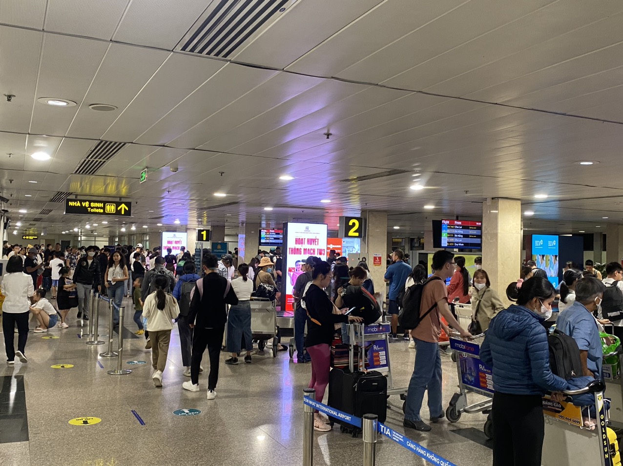 Cải thiện chất lượng dịch vụ tại sân bay Tân Sơn Nhất, tăng thu hút khách du lịch- Ảnh 1.