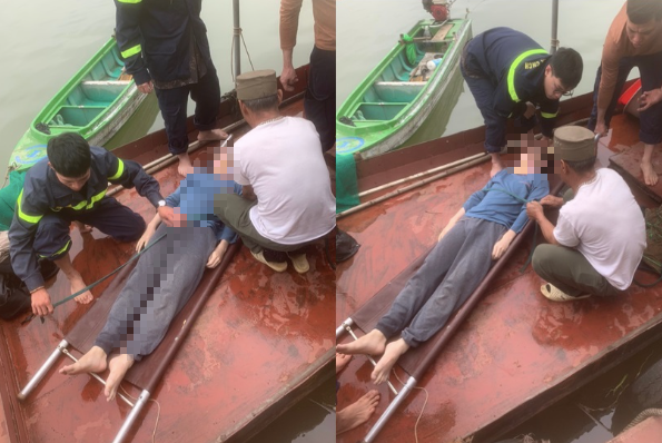 Cảnh sát phối hợp với dân thuyền chài cứu sống thanh niên nhảy cầu Vĩnh Tuy, Hà Nội- Ảnh 1.
