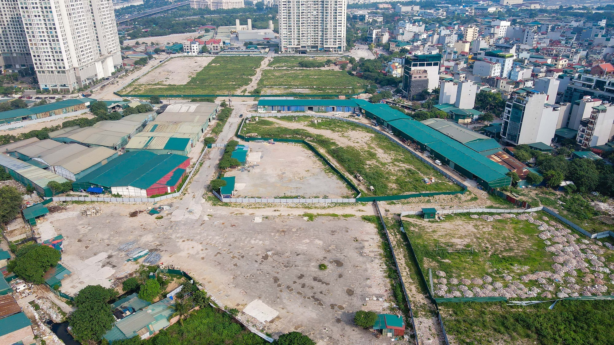 Tăng hơn 1.000ha đất xây dựng nhà ở xã hội tại Hà Nội và TP. HCM- Ảnh 1.