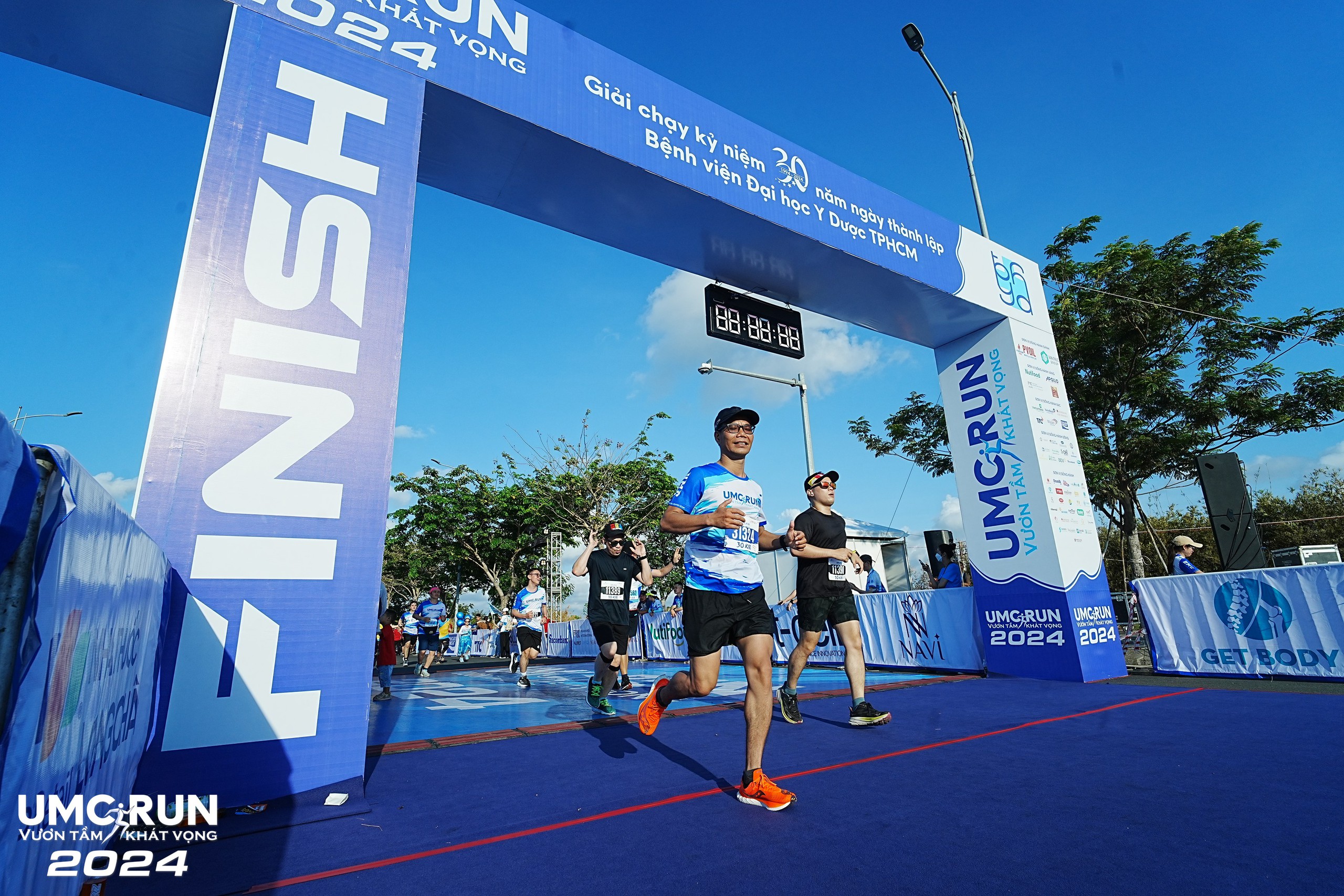 5.000 người tham gia giải chạy vì cộng đồng “UMC Run - Vươn tầm khát vọng”- Ảnh 10.