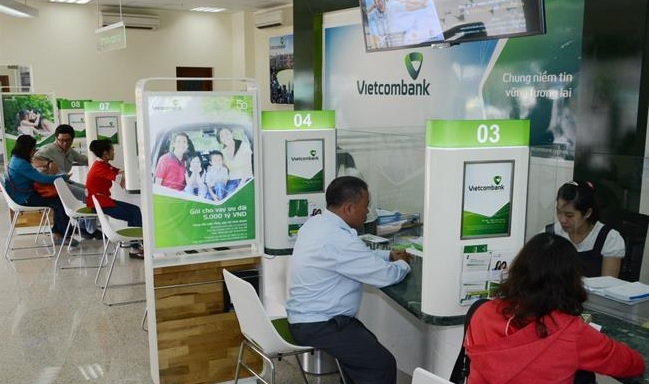 Vietcombank triển khai chương trình giảm lãi suất cho vay hỗ trợ và thúc đẩy tăng trưởng kinh tế năm 2024- Ảnh 1.