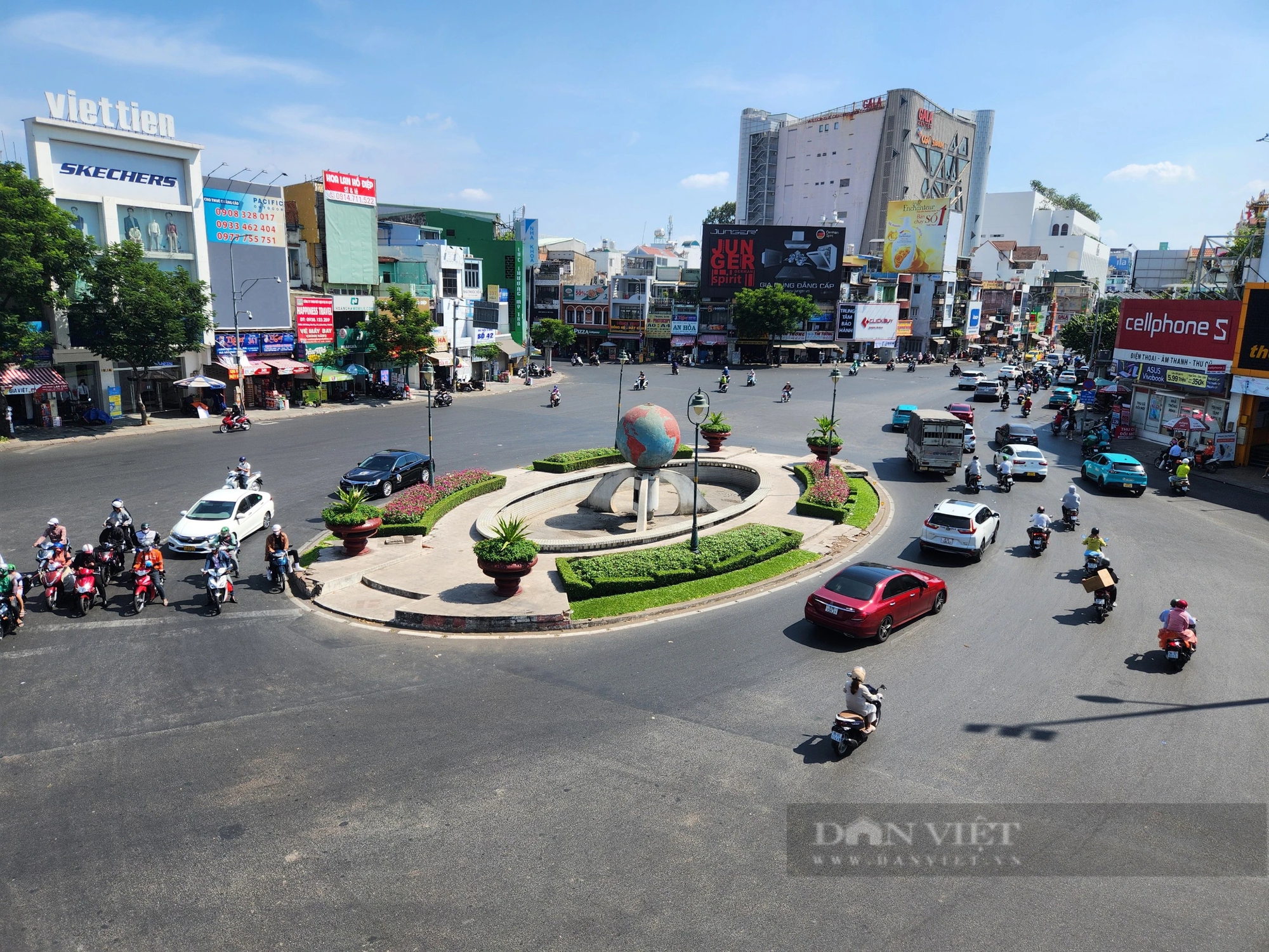 Những con đường rợp cây xanh, xua nắng nóng ở Sài Gòn            - Ảnh 1.