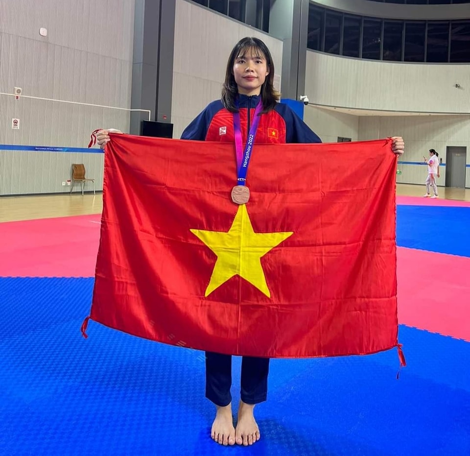 Đánh bại nhà vô địch ASIAD, nữ võ sĩ dân tộc Thái Bạc Thị Khiêm giành HCV Taekwondo châu Á- Ảnh 1.