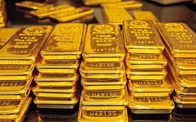 Vàng miếng SJC và vàng nhẫn chênh lệch 800.000 đồng, thấp nhất lịch sử- Ảnh 1.
