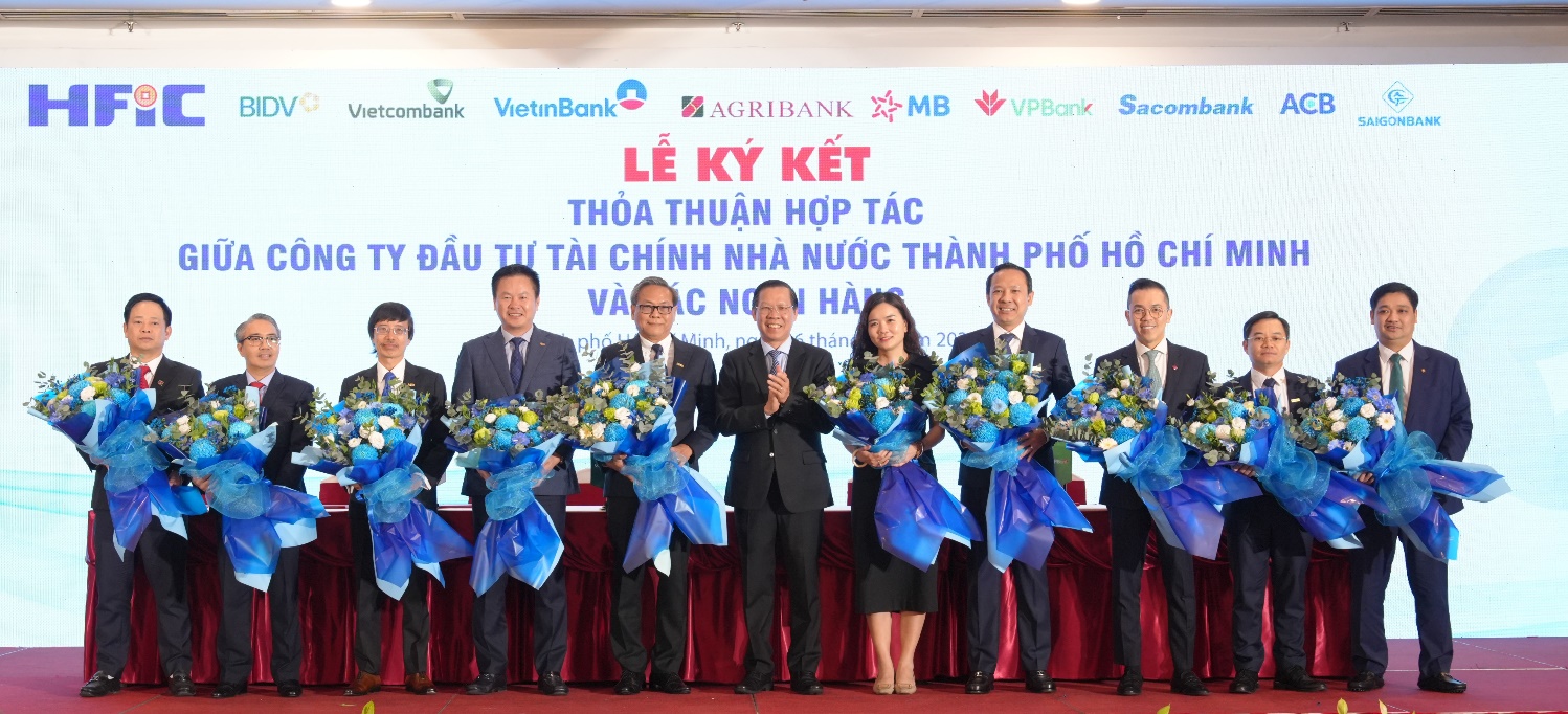 Sacombank và HFIC ký kết hợp tác phát triển kinh tế - xã hội TP.HCM - Ảnh 2.