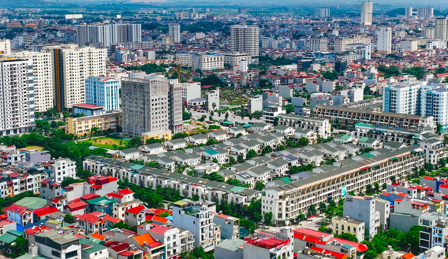 Bí thư, Chủ tịch và hàng trăm nghìn cán bộ được bố trí thế nào khi bỏ đơn vị hành chính cấp huyện? - Ảnh 1.