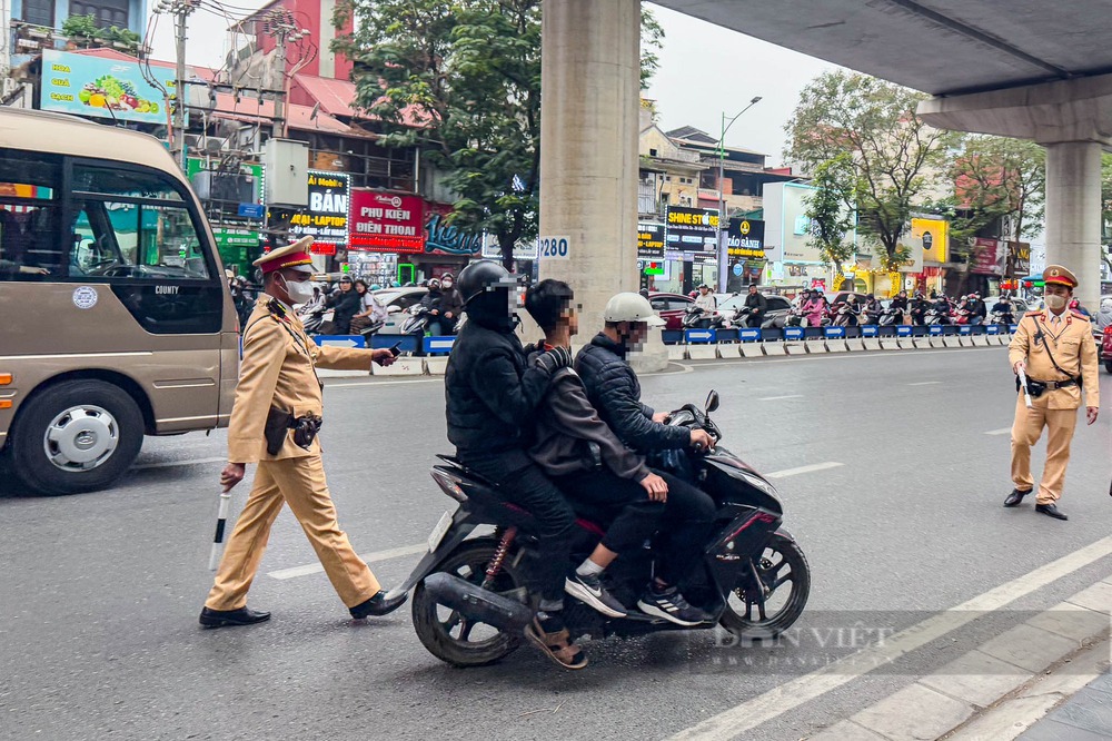 Người dân Hà Nội, TP Hồ Chí Minh chấp hành nghiêm chỉnh Nghị định 168 - Ảnh 34.