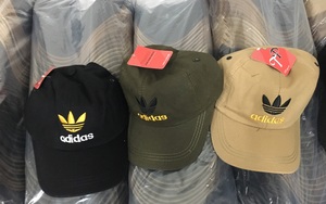 Gần 8.000 mũ lưỡi trai giả mạo nhãn hiệu nổi tiếng Adidas, Nike, Gucci, Louis Vuitton