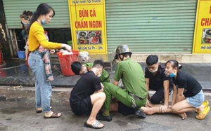 Video: Khống chế kẻ nghi ngáo đá dọa giết người đi đường, đánh công an, chặn ô tô trấn tiền