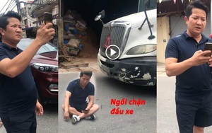 Clip nóng: Người đàn ông tự xưng là công an, ngồi giữa đường chặn đầu xe container đang di chuyển