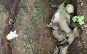 Video 'độc': Ukraine thả bom xuống chiến hào, lính Nga bắt được, quăng ra xa thoát hiểm trong gang tấc