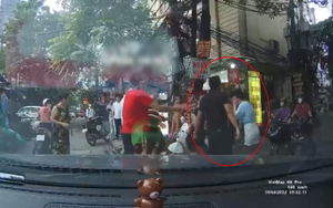Góc nhìn pháp lý vụ 2 người đàn ông hành hung nữ tài xế sau va chạm giao thông ở Hà Nội