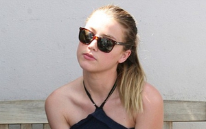 Amber Heard sau thua kiện