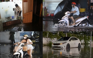 Phố Hà Nội ngập sâu sau cơn mưa lớn: Nhiều xe quay đầu không dám &quot;bơi&quot;, nước tràn cả vào nhà