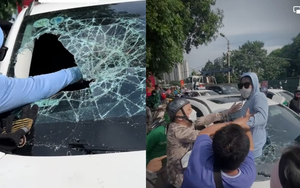 Nghi chồng chở "tiểu tam", vợ đánh ghen, đập vỡ kính ô tô trên đường phố Hà Nội 