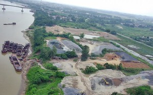 Huyện ngoại thành Hà Nội cam kết xử lý các bãi vật liệu không phép nằm ven sông Hồng