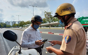 Góc nhìn pháp lý vụ nguyên Trưởng phòng Cảnh sát giao thông Công an tỉnh Trà Vinh “phù phép” biển số xe - Ảnh 3.