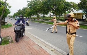 Hà Nội: Chạy quá tốc độ cho phép, loạt tài xế ngậm ngùi nộp phạt- Ảnh 1.