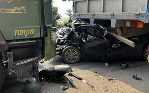 Ô tô con bẹp dúm, nằm lọt dưới gầm xe tải khiến 1 người tử vong sau tai nạn liên hoàn ở Hà Nội