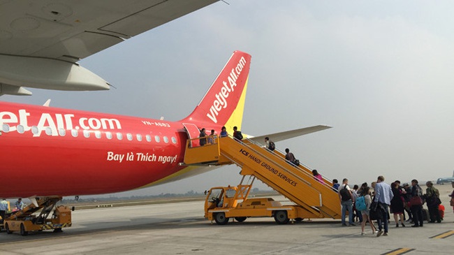 Vì sao có lệnh cấm, Vietjet Air vẫn bay tới tâm dịch bệnh Vũ Hán? - Ảnh 1.