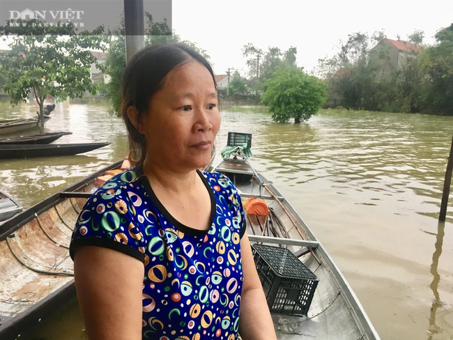 Người dân vùng “rốn lũ” Tân Ninh (Quảng Bình), húp cháo trắng, ăn mì tôm chờ lũ rút - Ảnh 6.