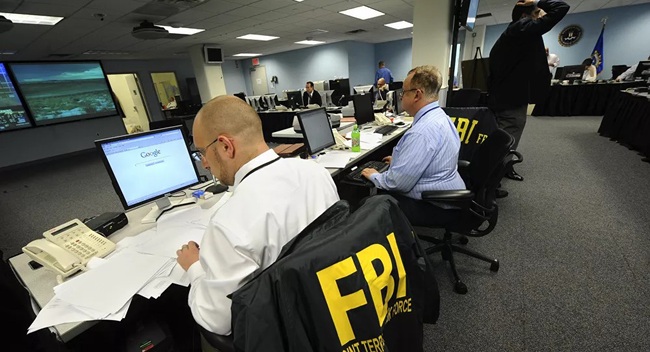 FBI tốTrung Quốc tấn công mạng các tổ chức nghiên cứu Covid-19 - Ảnh 1.