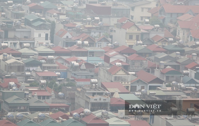 Hà Nội sương mù như Sa Pa, nhiều ôtô phải bật đèn đi giữa ban ngày - Ảnh 12.