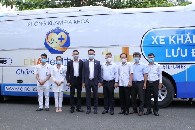 TTC và DHA Healthcare bàn giao xe khám bệnh lưu động xét nghiệm nhanh Covid-19 - Ảnh 4.