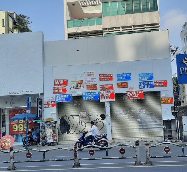 Chùm ảnh hàng loạt địa điểm kinh doanh tại TP.HCM đóng cửa, trả mặt bằng sau Tết Tân Sửu - Ảnh 6.