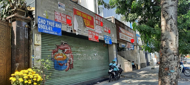 Chùm ảnh hàng loạt địa điểm kinh doanh tại TP.HCM đóng cửa, trả mặt bằng sau Tết Tân Sửu - Ảnh 7.