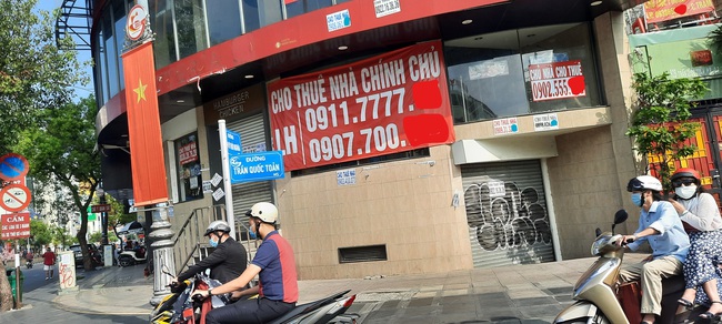Chùm ảnh hàng loạt địa điểm kinh doanh tại TP.HCM đóng cửa, trả mặt bằng sau Tết Tân Sửu - Ảnh 12.