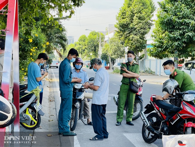 Bình Dương phong toả một đoạn đường vì phát hiện người Trung Quốc dương tính với SAR-CoV-2 - Ảnh 2.