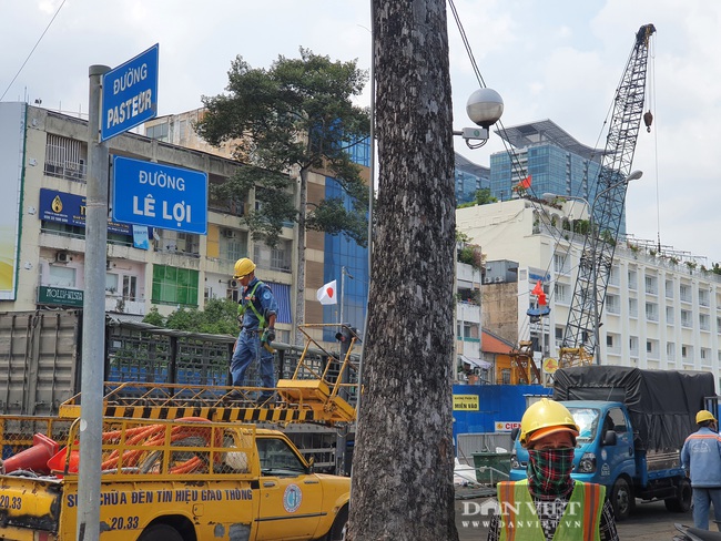 TP.HCM: Cận cảnh đường Lê Lợi sau 7 năm bị lô cốt của Metro số 1 bủa vây - Ảnh 2.