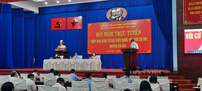 Chủ tịch nước Nguyễn Xuân Phúc tiếp xúc cử tri Củ Chi: Người dân mong tiêm vắc xin phòng Covid-19 cho người dưới 18 tuổi - Ảnh 4.