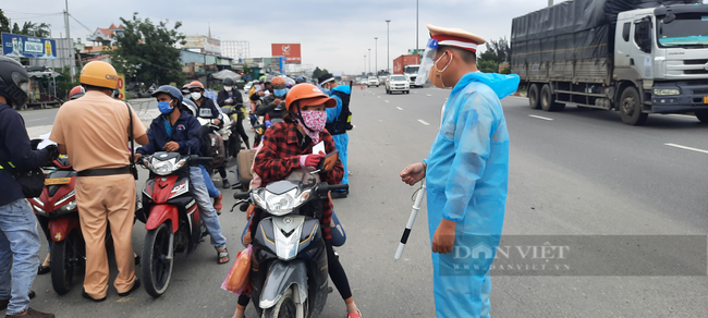 Chưa thống nhất được phương án đi lại giữa TP.HCM và Bình Dương, Đồng Nai, Long An, Tây Ninh - Ảnh 1.