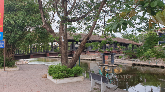 Ninh Bình: Chiêm ngưỡng cây cầu ngói hơn 100 năm tuổi, một trong 5 cây cầu ngói cổ đẹp nhất Việt Nam.  - Ảnh 3.
