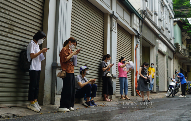 Hà Nội: Mỗi phường xác nhận thủ tục cho doanh nghiệp đi đường trong giãn cách xã hội một kiểu - Ảnh 3.