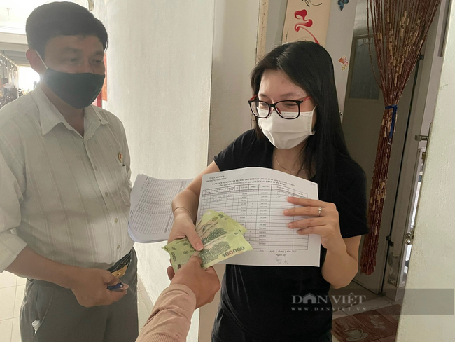 Đà Nẵng: Người dân trong vùng cách ly y tế nhận tiền hỗ trợ, nhiều người chia sẻ lại cho hộ khó khăn - Ảnh 2.