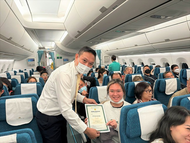 Vietnam Airlines kỷ niệm 1 năm mở đường bay thẳng Việt - Mỹ - Ảnh 3.