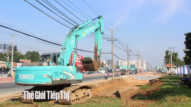 TP.Thuận An khẩn trương thực hiện dự án BOT nâng cấp mở rộng Quốc lộ 13. Ảnh: Trần Khánh