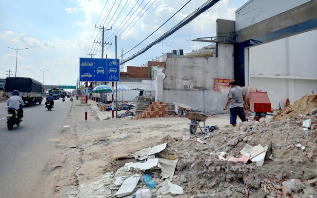 Công tác đền bù giải phóng mặt bằng ở Bình Dương còn nhiều khó khăn. Ảnh: Nguyên Vỹ