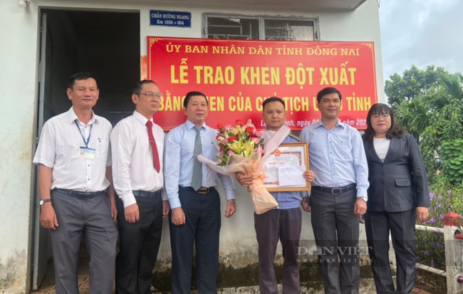Chủ tịch UBND tỉnh Đồng Nai tặng bằng khen cho nhân viên gác chắn đường sắt liều mình cứu người - Ảnh 2.