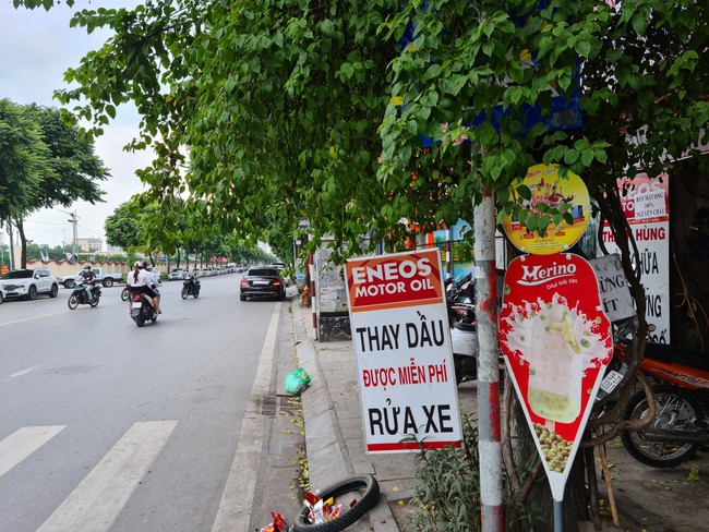 Tuyến phố kiểu mẫu đầu tiên ở Hà Nội lộn xộn sau 6 năm - Ảnh 7.