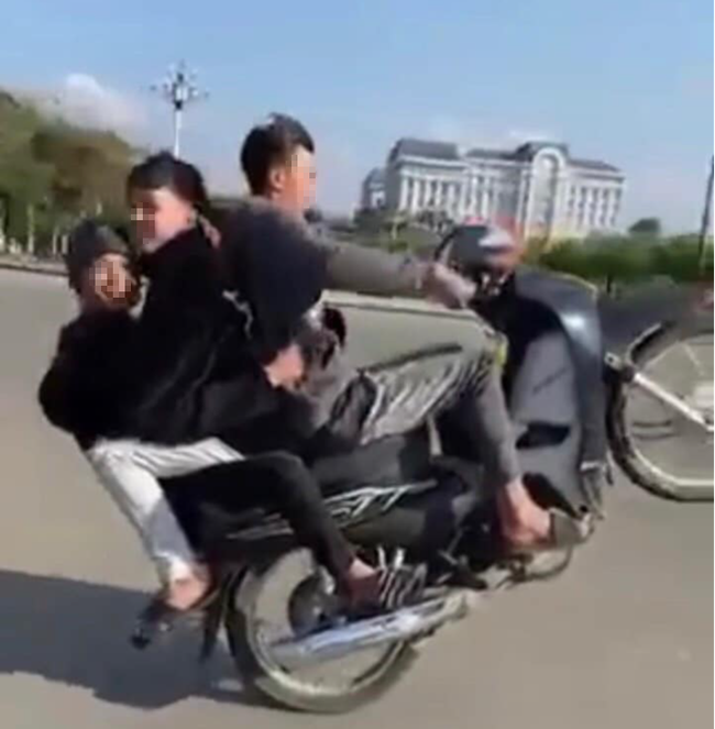 Lai Châu: Quay clip “bốc đầu” xe máy lên mạng xã hội, nhóm thanh niên bị triệu tập - Ảnh 1.