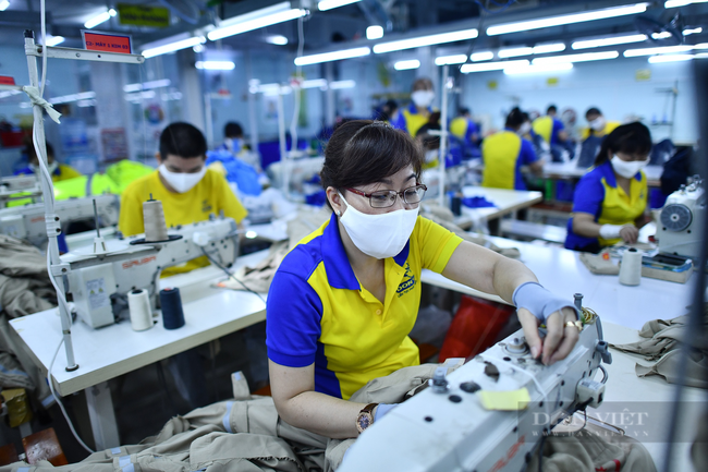 Trung Quốc mở cửa, doanh nghiệp dệt may sẽ gặp nhiều thách thức - Ảnh 1.